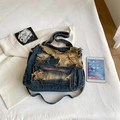 Vintage-Bucket-Tasche aus Denim mit Distressed-Details und großem Fassungsvermögen - Denim-Blau