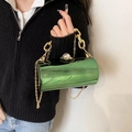 Cylindrical acrylic evening bag in mirror green with pearl clasp and gold chain strap - Green