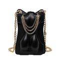 Avant-garde black PU leather crossbody bag with anatomical curves and layered metal chains - Black