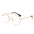 Retro Polygon runde goldene Metall-Sonnenbrille mit schwarzen Bügelenden und Nasenpads - Transparent