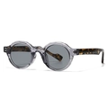 Retro round sunglasses with grey scalloped frames and tortoiseshell temples shown at a 45-degree angle - Translucent Grey Frame Grey Lens