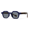 Retro geometric sunglasses with dark blue frame and tortoise shell temples from a 45-degree angle - Blue Frame Light Grey Lens