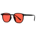 Lunettes de soleil rétro rondes à monture noire et verres transparents rouges vifs - Monture noire verres rouges