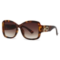 Modern oversized tortoiseshell sunglasses with brown gradient lenses and gold metal accents - Tortoiseshell Frame Tea Lens