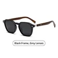 Gafas de sol polarizadas redondas con montura negra y patillas de madera natural veteada - Montura Negra Lentes Gris Negro