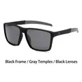 Classic square matte black polarized sunglasses with grey accents shown from a 45-degree angle - Black Frame Grey Leg