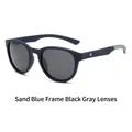 Gafas de sol redondas polarizadas con montura azul arena y lentes de color gris oscuro - Marco Azul Mate Lentes Grises