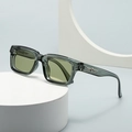 Modern rectangular sunglasses with translucent grey frames and green lenses on geometric stands - Olive Green Yellow Lens