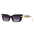 Modern cat-eye sunglasses with black frames, purple gradient lenses, and gold chain temples - Black Frame Purple Gradient Lens