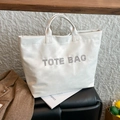 Grande borsa tote bianca in PU con scritta TOTE BAG in strass scintillanti - Bianco