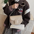 Retro beige saddle bag for women with vintage pebble leather and adjustable crossbody strap - Khaki