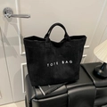 Large black suede tote bag with white TOTE BAG lettering for office and daily wear - Black