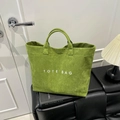 Large capacity green corduroy tote bag with minimalist white TOTE BAG lettering for women - Green