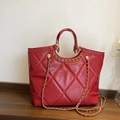 Red quilted tote bag with gold chain strap and top handle for women's office fashion - Red