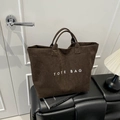 Large dark brown suede tote bag with minimalist white TOTE BAG text print - Brown