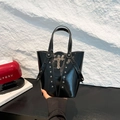 Black glossy punk bucket bag featuring silver cross pendant and rivet studs detail - Black