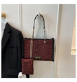 Detail of red leopard print tote bag with plush trim and fashion metal chain strap - One Size / Red