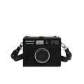 Dettaglio della borsa a tracolla a forma di fotocamera in pelle martellata e fibbie argentate - Nero