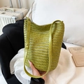 Handwoven grass green bucket bag with adjustable strap in a stylish casual setting - Light Green / Large 30*16*31cm