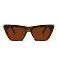 Gafas de sol cat eye modernas con montura de carey oscuro y detalles metálicos dorados - Montura de Leopardo / Lentes Té