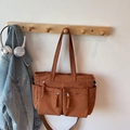 Caramel corduroy tote bag with dual front zipper pockets and woven pull tabs - Brown