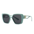 Modern mint green cat-eye sunglasses with hollow metal temples on a white background - Green/Black Grey (C4)