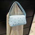 Light blue pebbled leather baguette bag with silver rivets and a matching shoulder strap - Blue