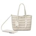 Cream white cutout leather tote bag with laser-cut patterns and cat charm accessory - White