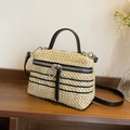 Beige handwoven straw crossbody bag with black stripes and matching shoulder strap - Khaki