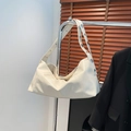 Chic off-white patent leather crescent bag with silver studded strap for shoulder wear - White