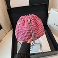 Pink hand-woven crochet bucket bag with silver butterfly clasp and delicate bead chain - Pink
