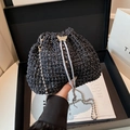 Elegant black crochet bucket bag with metallic thread and silver butterfly charm - Black