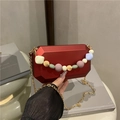 Red geometric acrylic evening clutch with colorful bead handle and gold chain strap - Red