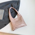 Pink gothic hobo bag featuring silver metal rivets and stylish punk shoulder strap - Pink