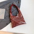 Chic burgundy motorcycle bag with silver rivets and polished leather finish - Burgundy