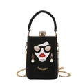 Borsa in acrilico nero con design ragazza con occhiali e tracolla a catena dorata - Nero