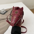 Unique burgundy horse head mask bucket bag with gold rivets and leather crossbody strap - Red