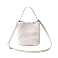 Creamy white woven bucket bag with leather texture and adjustable shoulder straps - White