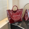 Burgundy faux crocodile leather tote bag with white TOTE BAG text and glossy finish - Red