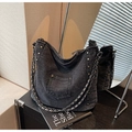 Detail of gray denim tote with vintage copper rivets and woven metal chain strap - Black