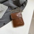 Brown mini phone crossbody bag with gold chain woven trim and glossy finish - Brown
