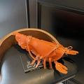 Creative orange lobster shaped shoulder bag in premium leather finish for unique women fashion - Brown