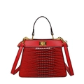 Elegant red crocodile texture handbag with golden hardware clasp and crossbody strap - Red