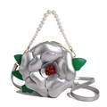 Silver camellia flower evening bag with pearl handle and green leaf detail - Silver