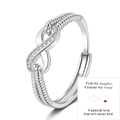 Detalle del anillo de infinito plateado con piedras y tarjeta de regalo madre-hija - Color Oro Blanco (Con Tarjeta de Felicitación)