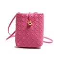 Pink woven mini crossbody bag with a gold ball clasp and sleek leather finish - Rose Red