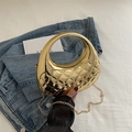 Chic golden crescent acrylic handbag with quilted texture and fine chain strap - Gold