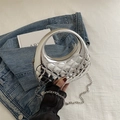 Silver metallic acrylic mini handbag featuring quilted texture and round handle - Silver