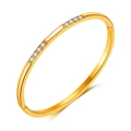 Detail of 18k gold plated titanium steel bangle with inlaid crystals and mother of pearl - Gold Color Rhinestone (33-B-7)
