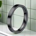 Polished black stainless steel minimalist ring with sleek reflective surface on white base - Black